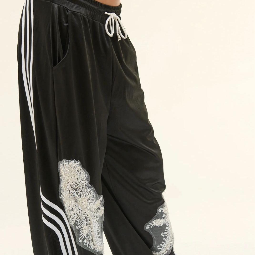 Pantalone con ricamo Spazio22